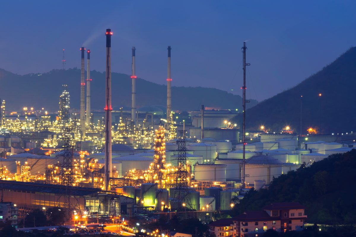 Refinery and storage tanks at night.
